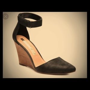 Never worn new Black Audrey Brooke wedge pumps